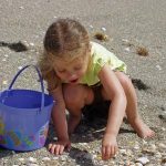 Kids collecting seashells