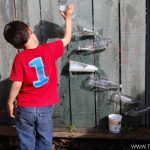 Kid Playing at Water Wall