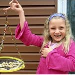 Kids Making Birdfeeders