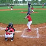 Kids playing Baseball