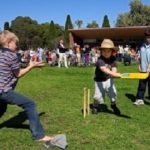 Kids playing Cricket