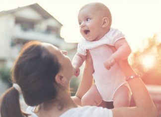 how to hold a baby