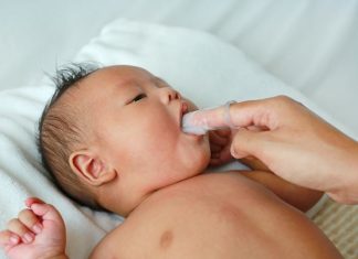 how to clean baby tongue